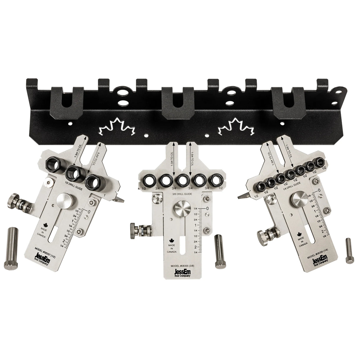 Precision woodworking doweling jig set with metal guides and wall-mounted holder.