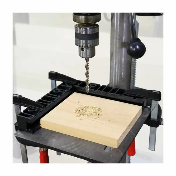 Drill press with drill bit and clamped wood, ideal for woodworking precision drilling