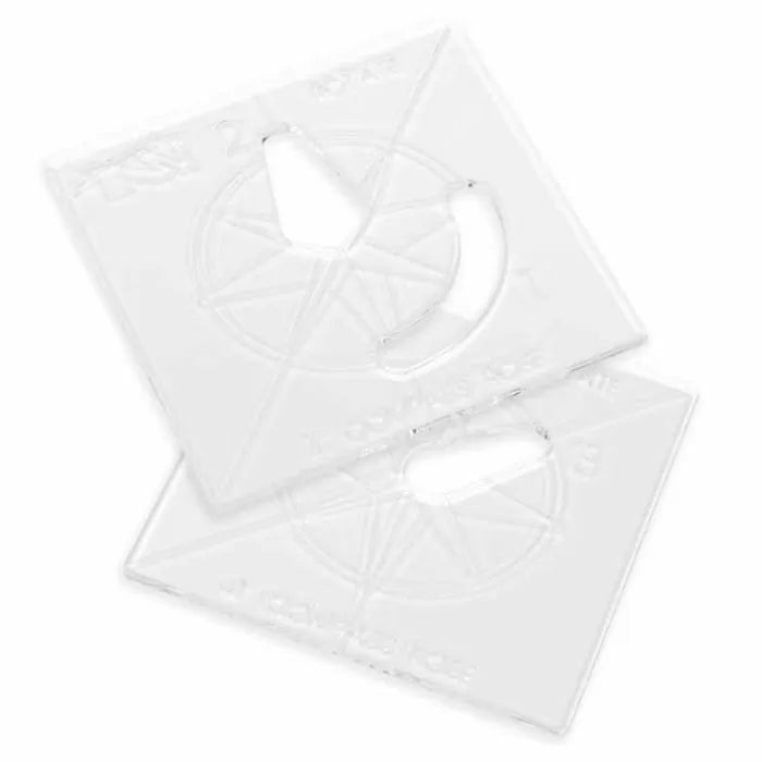 Clear plastic woodworking router templates with geometric cutouts on white background