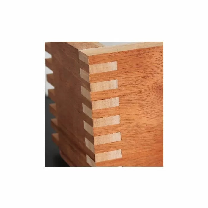 Close-up of a wooden box corner with precise finger joint woodworking