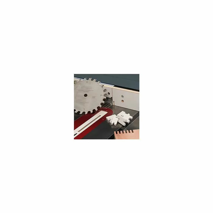 Dado blade set on table saw with sample box joint cuts for woodworking joinery
