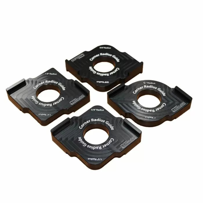 Set of four black corner radius guide woodworking templates on white background