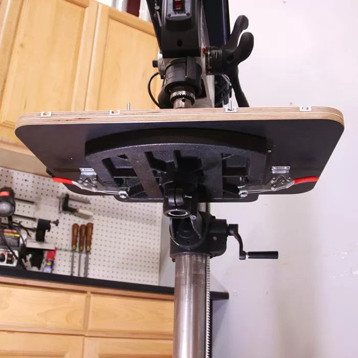 Drill press table upgrade mounted on drill press in woodworking shop
