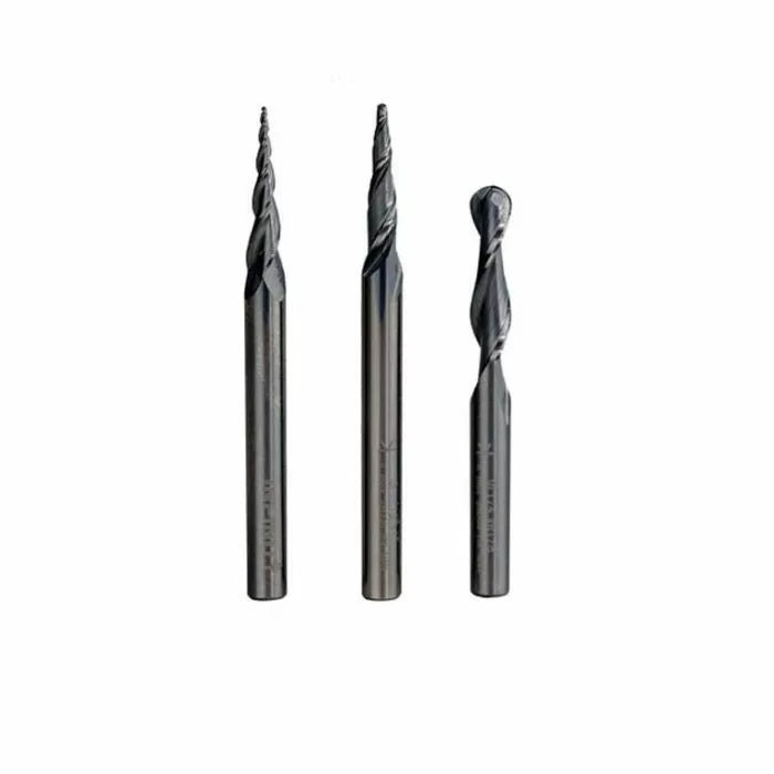 Three spiral router bits for woodworking, each with different flute designs