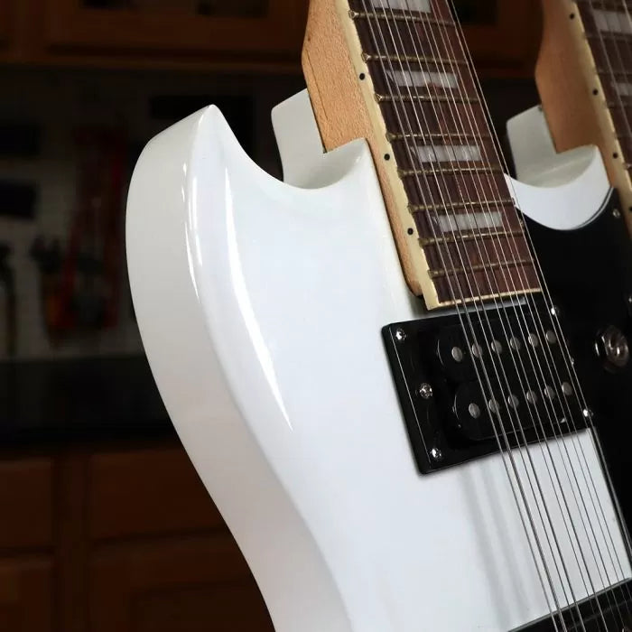 Close-up of white double neck electric guitar bodies with strings and pickups