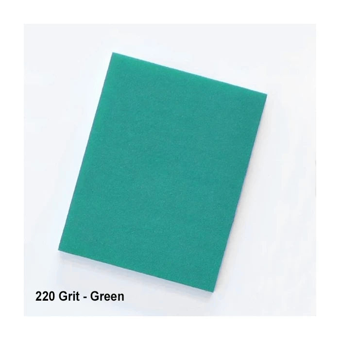 Green 220 grit sanding sponge for woodworking, shown on white background