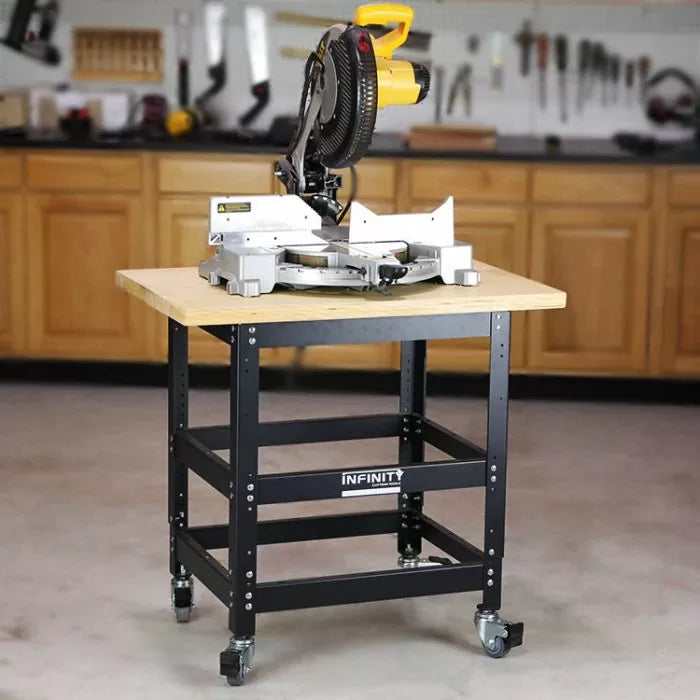 Heavy-duty miter saw stand with saw on lockable caster wheels in a workshop setting