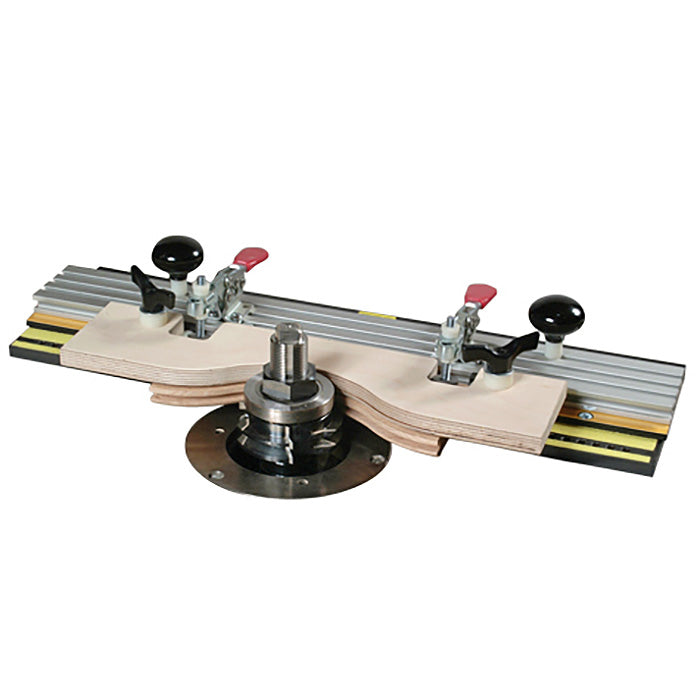Router table jig with clamps and guide rail set up for precise woodworking cuts