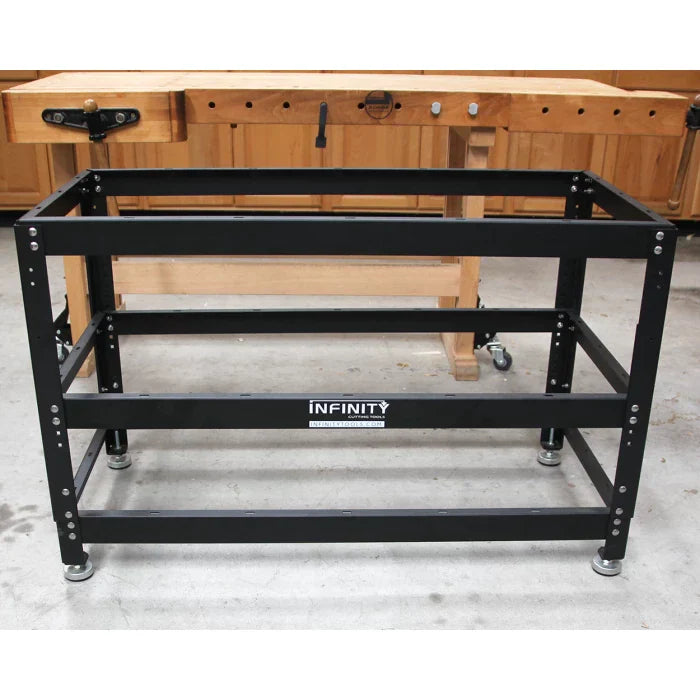 Heavy-duty adjustable steel router table stand frame with leveling feet in a workshop