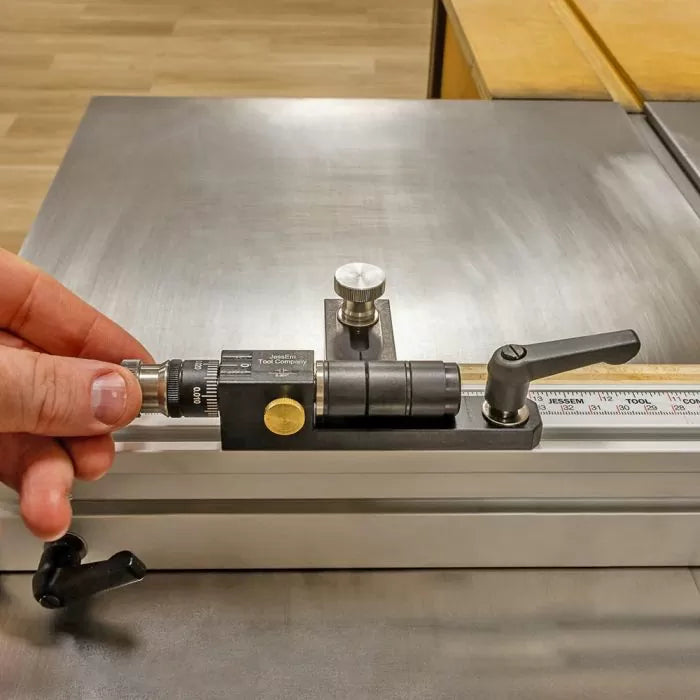 Precision woodworking router table fence stop with micro-adjuster on aluminum rail