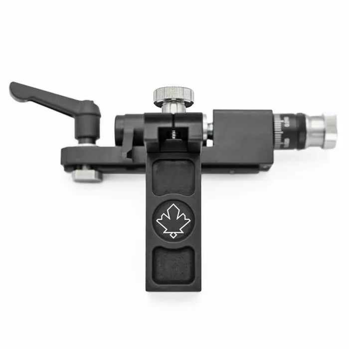 Precision black woodworking tool with adjustment knobs and maple leaf design, isolated on white