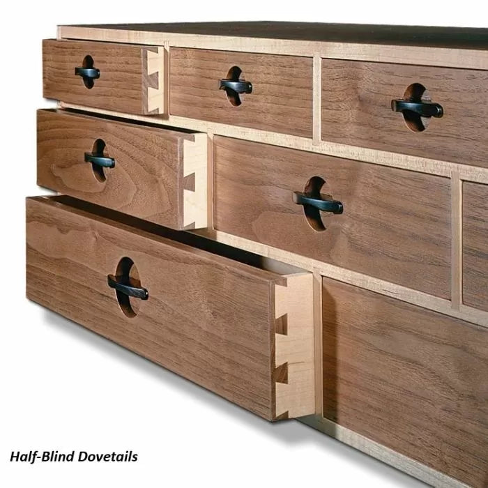 Wooden drawers with half-blind dovetail joints and modern black handles