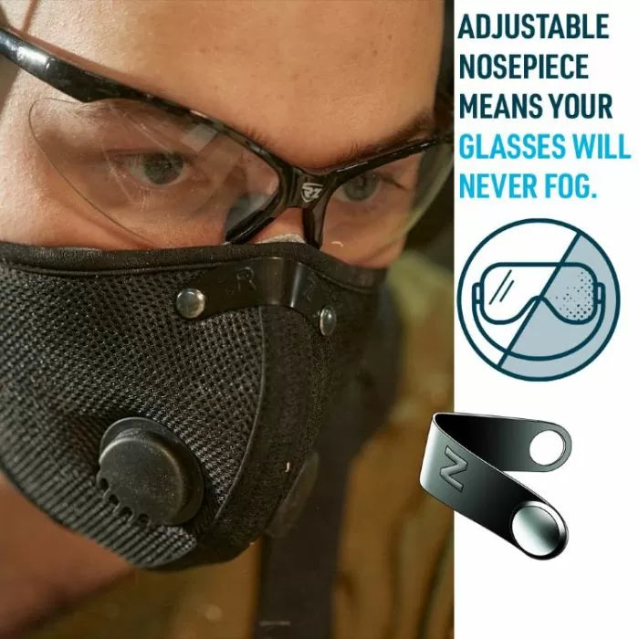 Woodworker wearing safety glasses and a dust mask with adjustable nosepiece to prevent fogging.