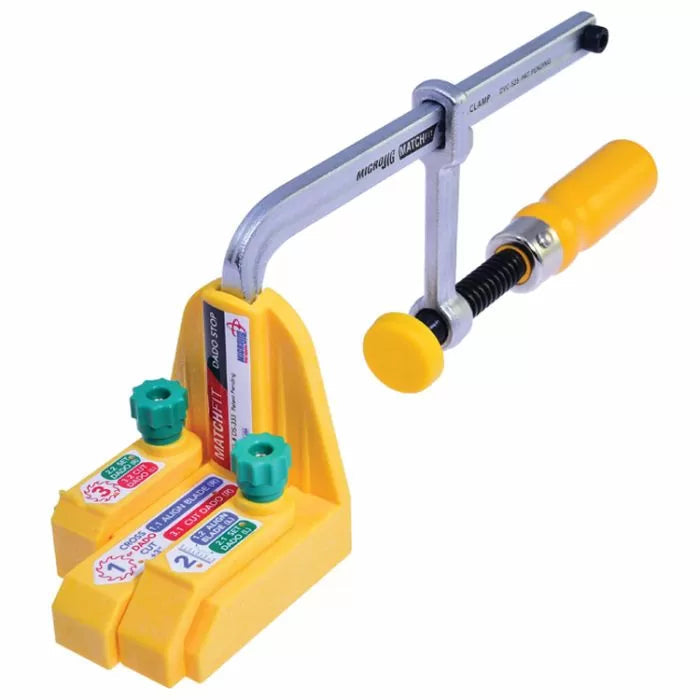 Yellow woodworking clamp tool with adjustable handle and labeled guides for precision cutting.