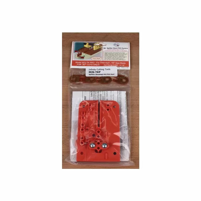 Orange table saw splitter system kit for thin kerf 10-inch blades, packaged on wood surface