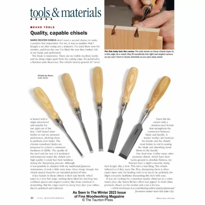 Set of five wood chisels with light wooden handles arranged on a magazine article about hand tools.