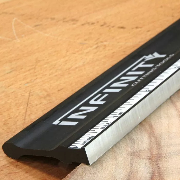 Aluminum track with ruler edge for woodworking on wooden workbench