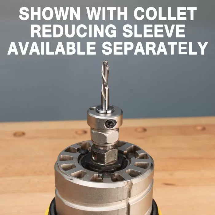 Router motor with small spiral bit in collet reducing sleeve on woodworking bench