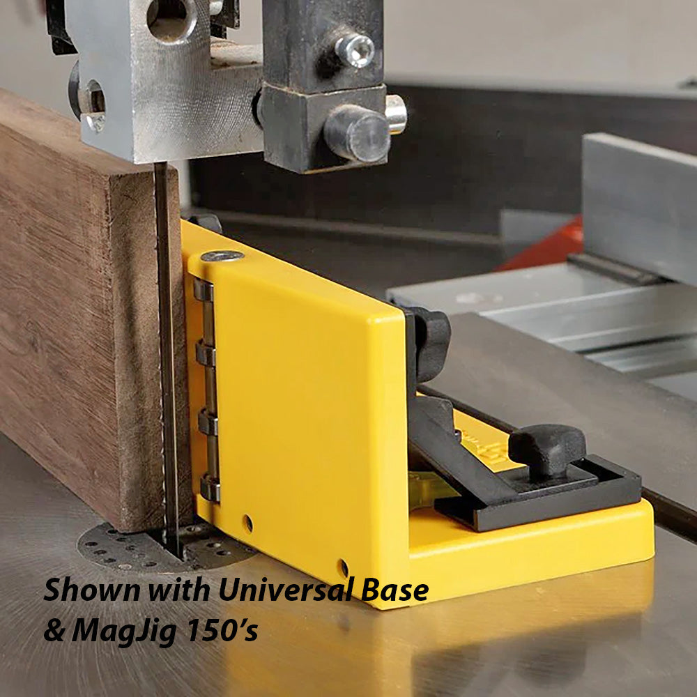 Yellow resaw guide with universal base and MagJig 150's attached to a bandsaw cutting wood