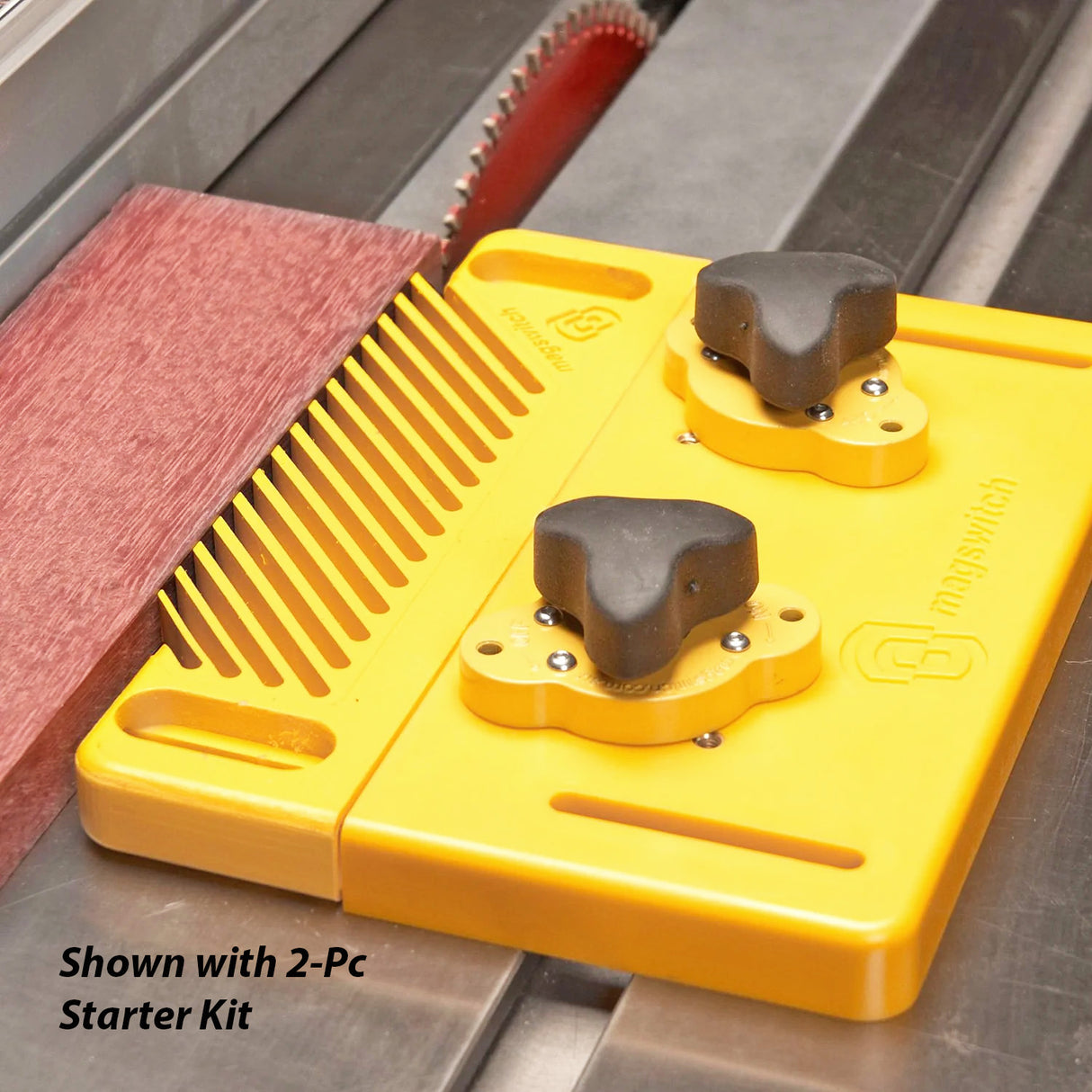 Magnetic featherboard holding wood against table saw blade for precise woodworking cuts