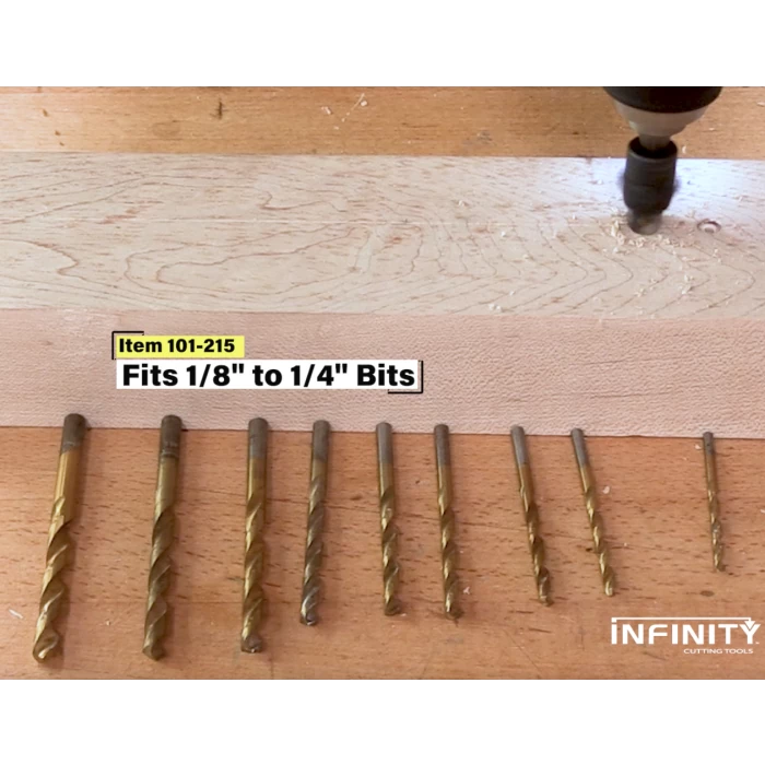 Assorted woodworking drill bits 1/8 to 1/4 inch displayed on a wooden workbench.