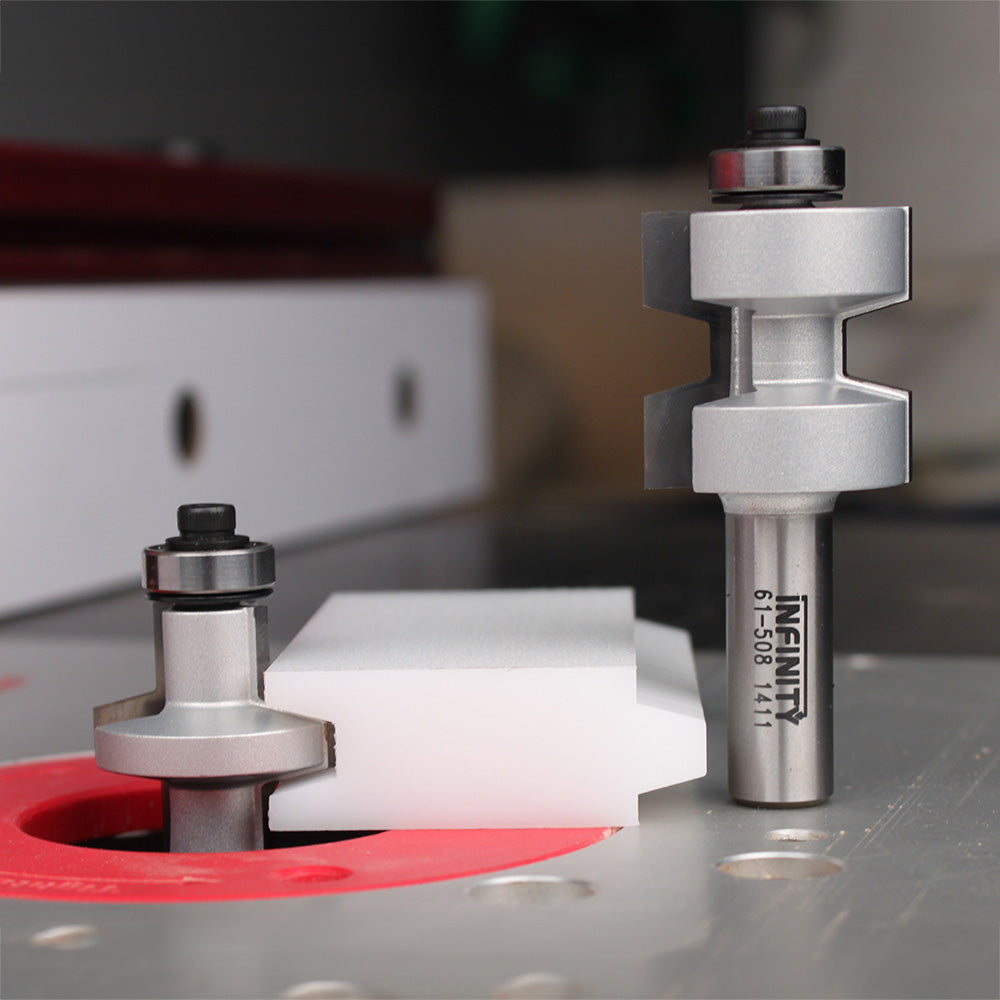 Router table with two stacked router bits and precision-cut wood workpiece