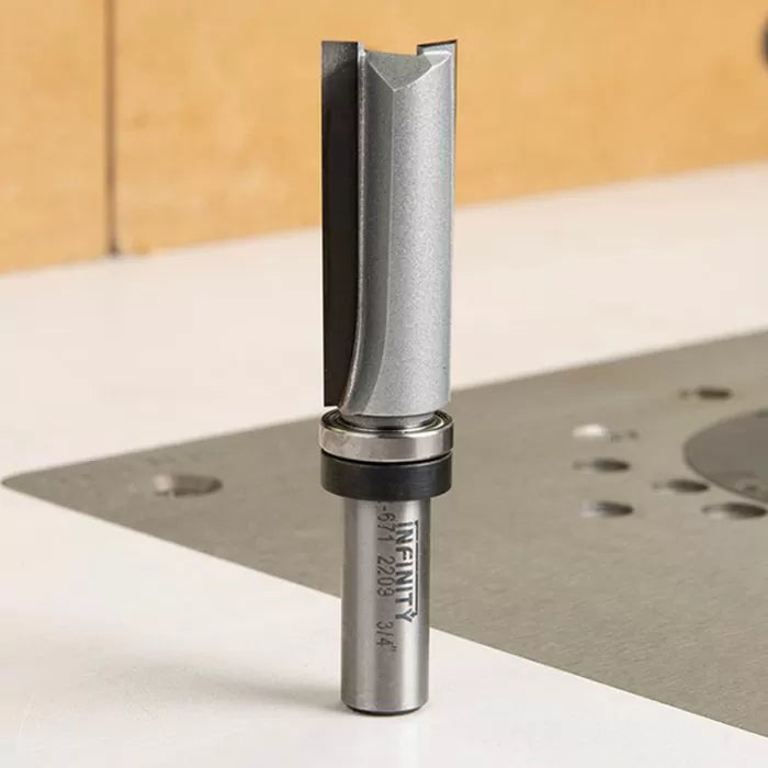 Straight router bit with bearing for woodworking on a router table surface