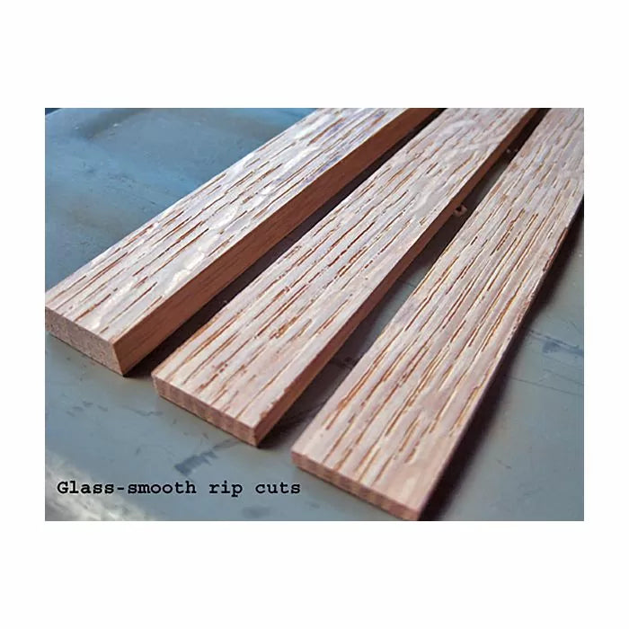 Smoothly cut wooden boards with glass-smooth rip cuts on a work surface for woodworking projects.