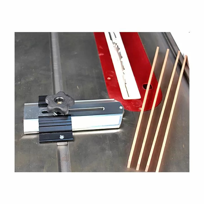 Table saw thin rip jig with guide rail and wooden strips for precise woodworking