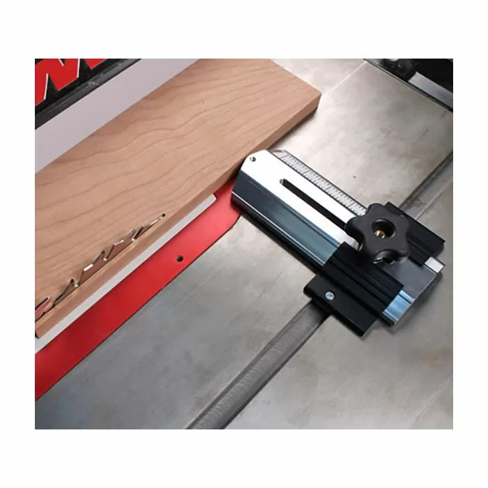 Table saw fence system with wood guide and adjustable stop block for precise woodworking cuts
