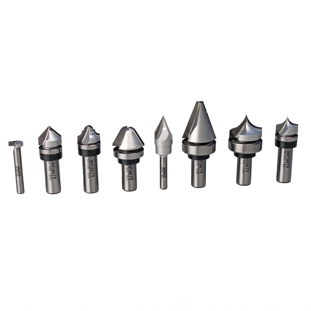 Assorted woodworking router bits set with various cutting profiles on white background