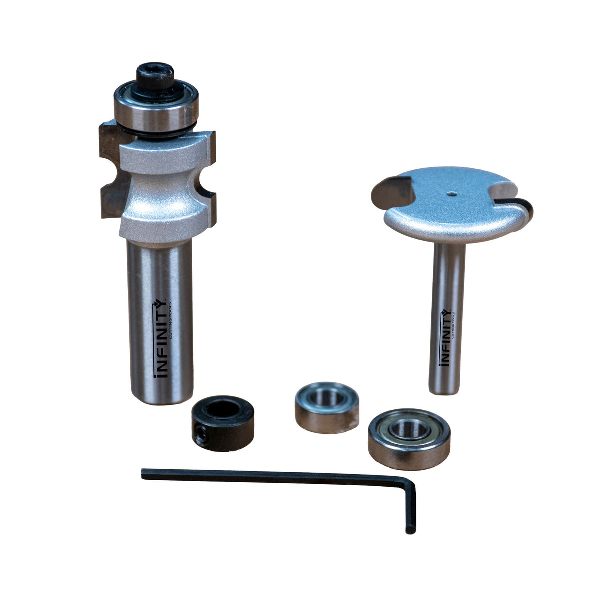 Woodworking router bit and slot cutter set with bearings and hex wrench on white background