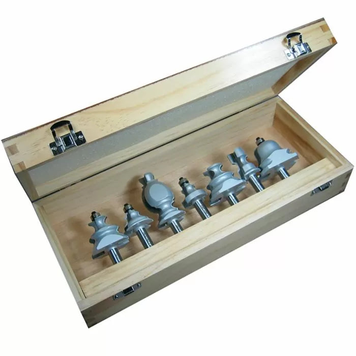 Woodworking router bit set with six bits in a wooden storage case