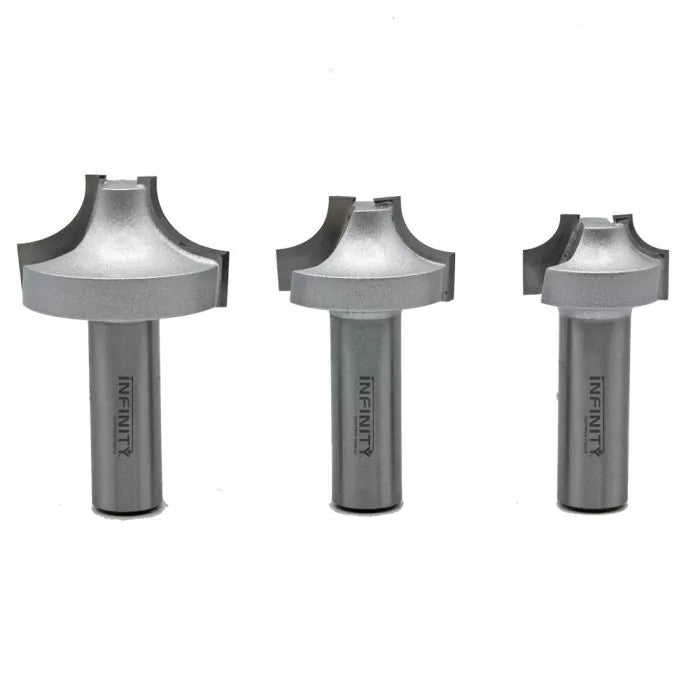 Set of three roundover router bits for woodworking on white background