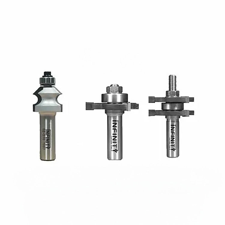 Three precision woodworking router bits with ball bearings and metal shanks on white background.