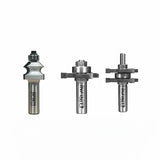Three precision woodworking router bits with ball bearings and metal shanks on white background.