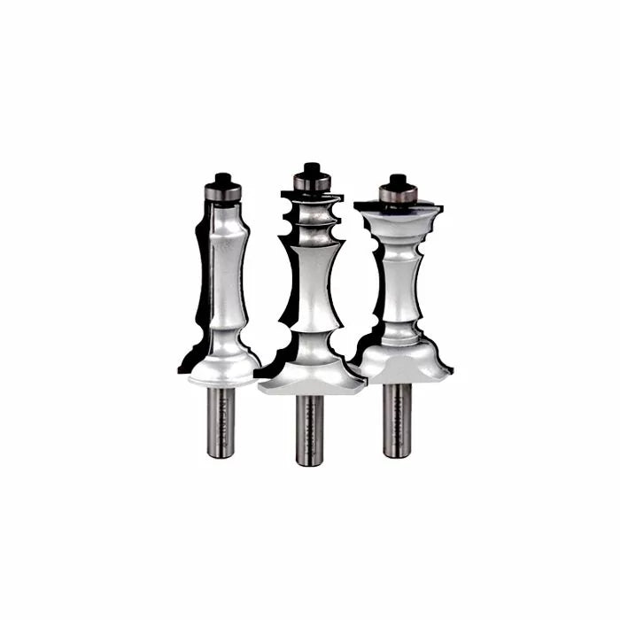 Three decorative router bits for woodworking with intricate profiles on a white background.