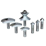 Set of seven carbide woodworking router bits in various profiles on a white background