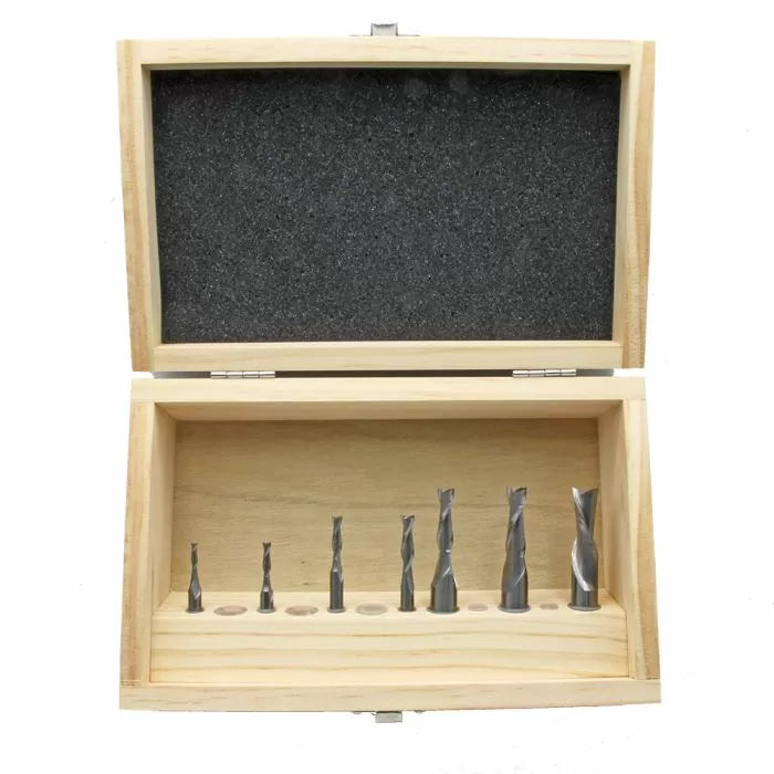 Wooden box set of spiral router bits for woodworking, displayed in foam-lined case