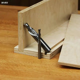 Straight router bits on plywood with woodworking jig for precise joinery