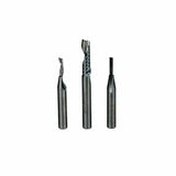 Set of three carbide router bits for woodworking on white background
