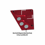 Red lock miter bit setup jig with rare earth magnets and white alignment markings.
