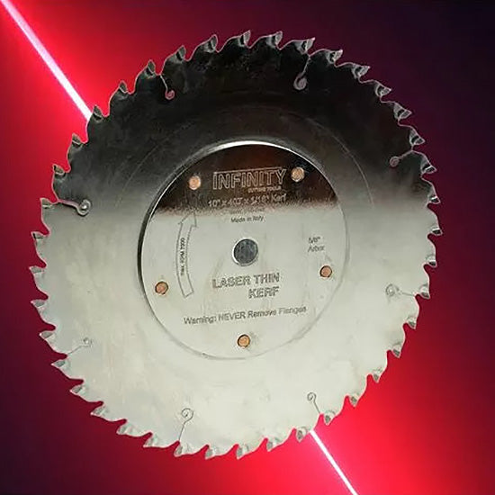 Laser thin kerf circular saw blade for woodworking with sharp teeth on a red background.