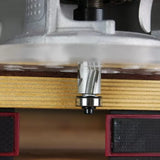 Carbide router bit with bearing in a woodworking router cutting edge of a wood board