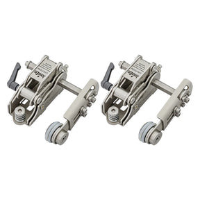Pair of metal woodworking hold down clamps with adjustable levers and rollers on white background