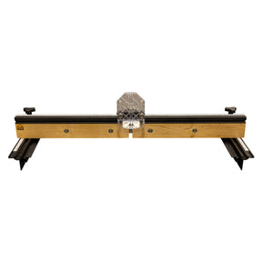 Woodworking router table fence with clear dust collection guard and measuring rails