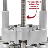 Close-up of woodworking router lift with threaded rod for smooth height adjustment.