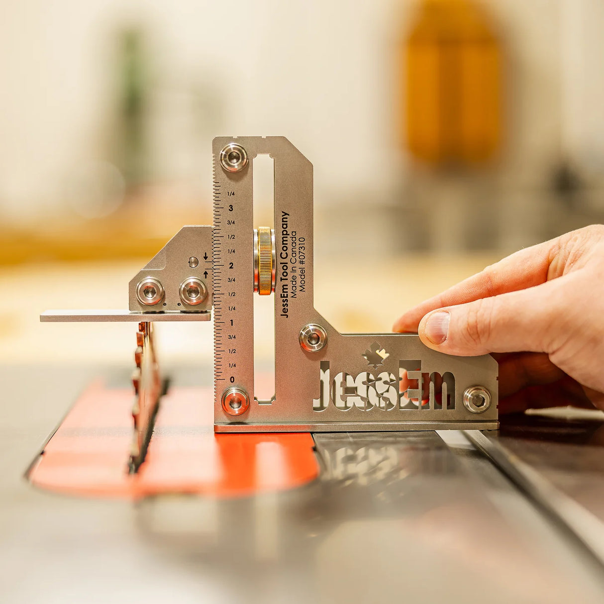 Precision woodworking gauge measuring blade height on a table saw in workshop setting