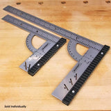 Two metal woodworking squares with protractor guides on wooden workbench