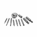 Set of precision woodworking router bits and accessories on white background